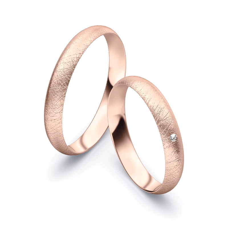 Aufnahme von schlichten eismatten Trauringen aus Rosegold mit Diamant mit 3,5 mm Breite