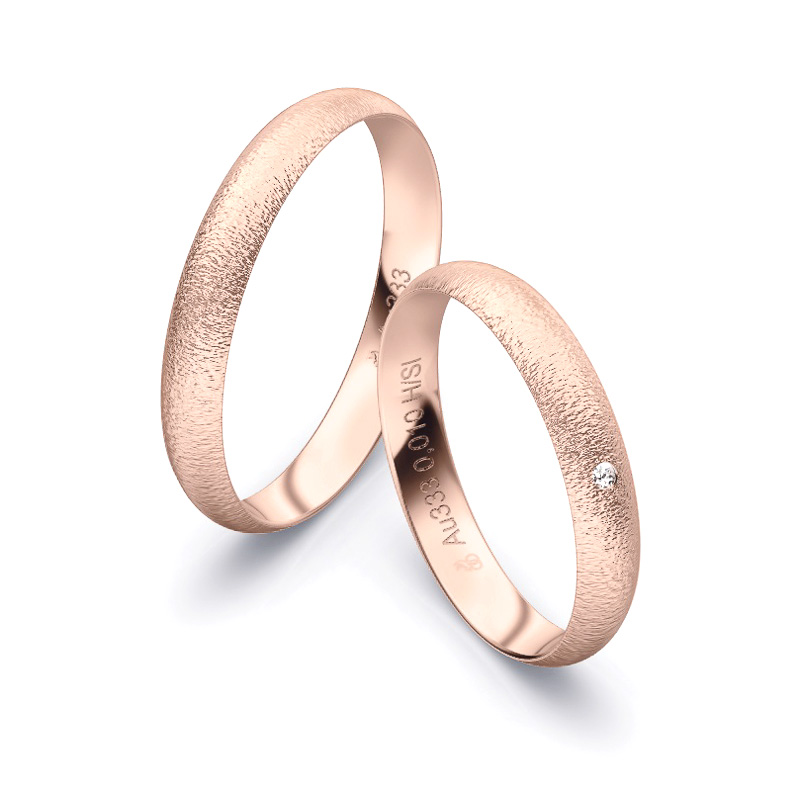 Aufnahme von Eheringen aus Roségold mit Körnung und Diamanten und 3,5 mm Breite 