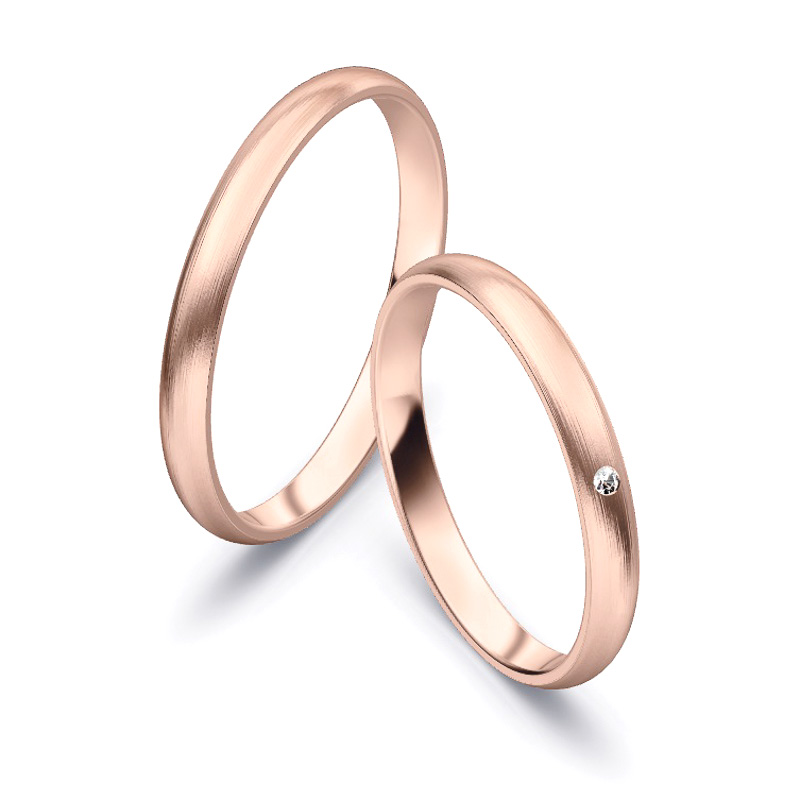 Aufnahme von schlichten matten Trauringen aus Rosegold mit Diamanten mit 2,5 mm Breite