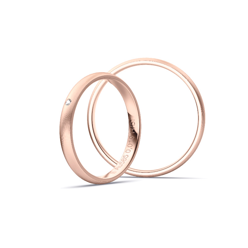 Aufnahme von schlichten matten Trauringen aus Rosegold mit Diamanten mit 2,5 mm Breite