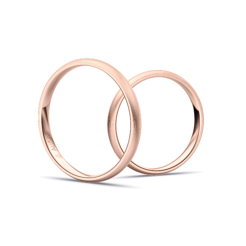 Aufnahme von schlichten matten Trauringen aus Rosegold mit Diamanten mit 2,5 mm Breite