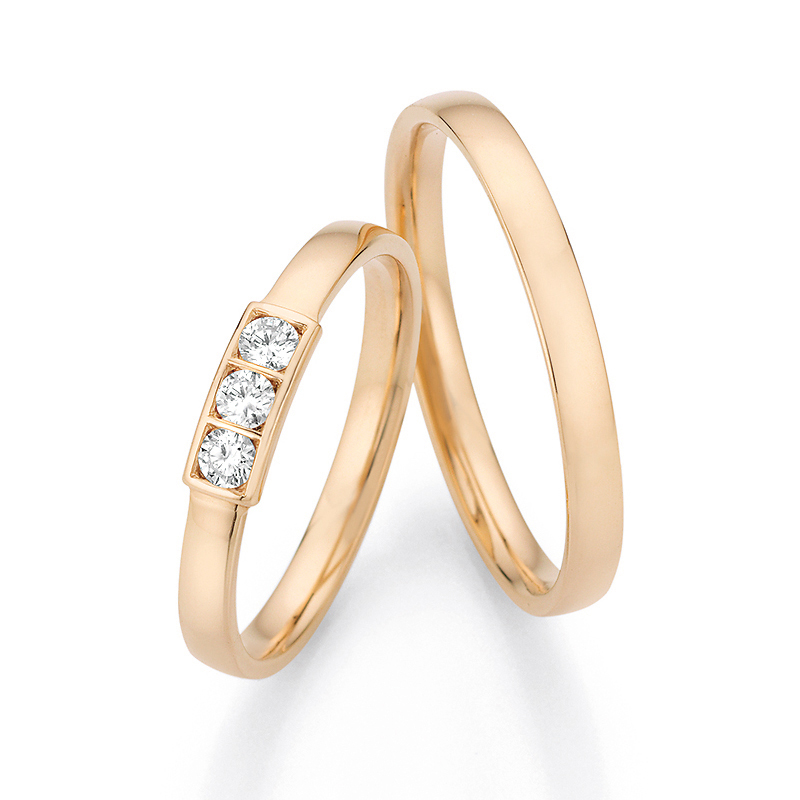 schmale Eheringe aus Roségold mit 3 Diamanten