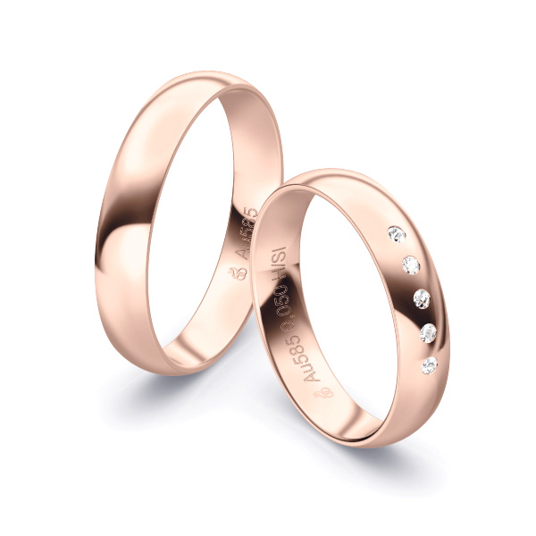 Aufnahme von polierten Rosegold Eheringen mit 5 Diamanten in 4 mm Breite