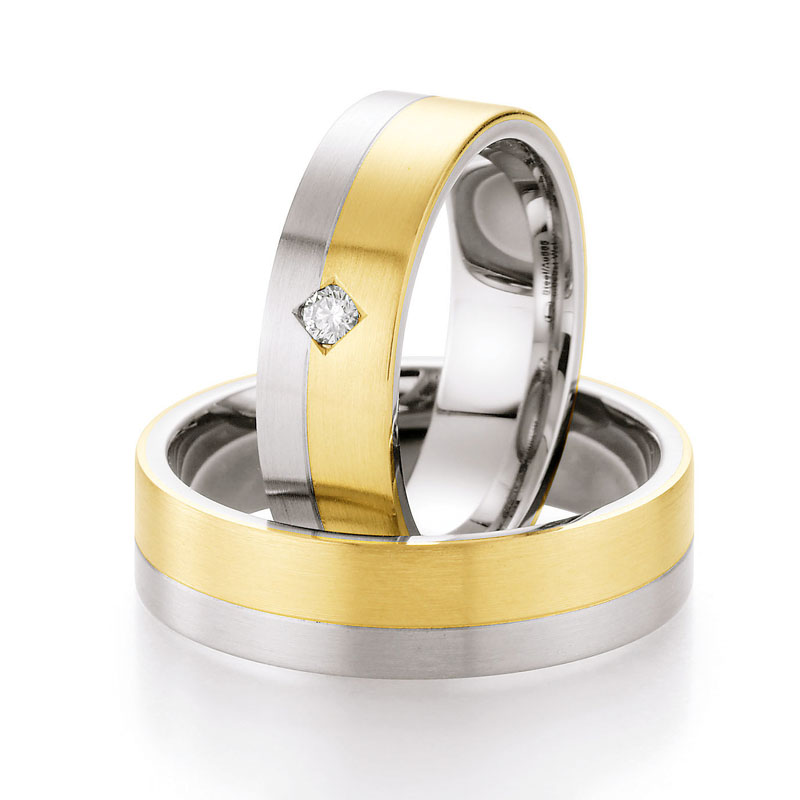 Eheringe Trauringe aus Stahl & Gelbgold mit Diamant Ruesch Collection Nowotny 88/05050-060