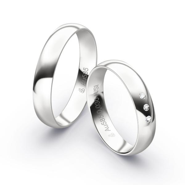 Aufnahme von polierten Weißgold Eheringen mit 3 Diamanten in 4 mm Breite