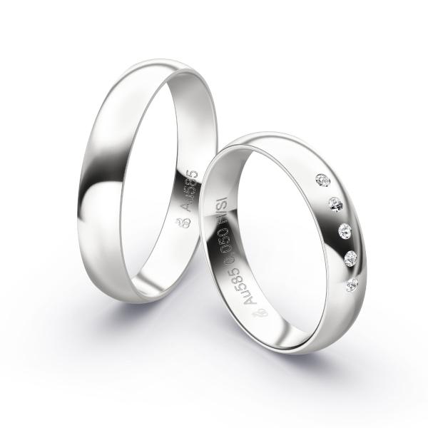 Aufnahme von polierten Weißgold Eheringen mit 5 Diamanten in 4 mm Breite