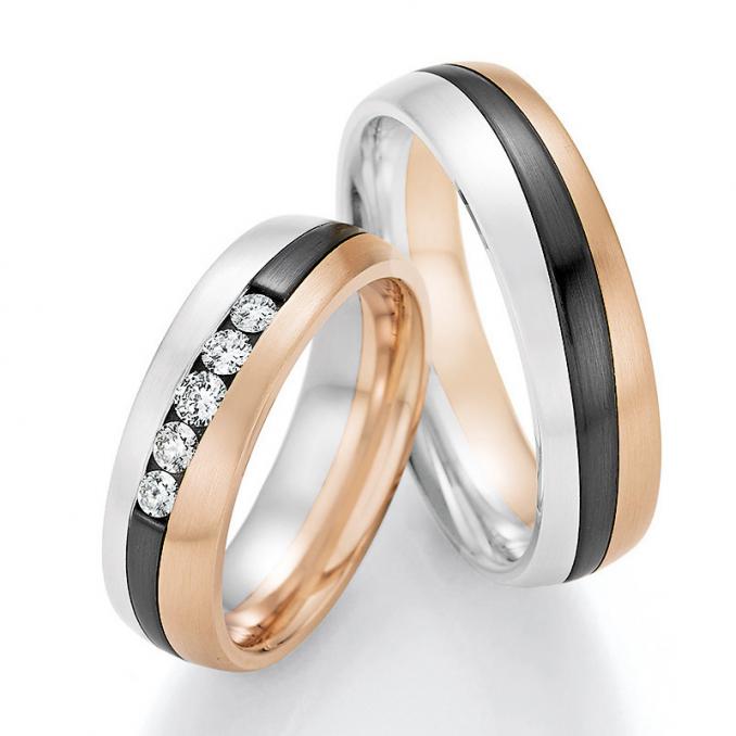 Aufnahme von Eheringen aus Weißgold&Roségold&Zirconium mit fünf weißen Diamanten trikolor
