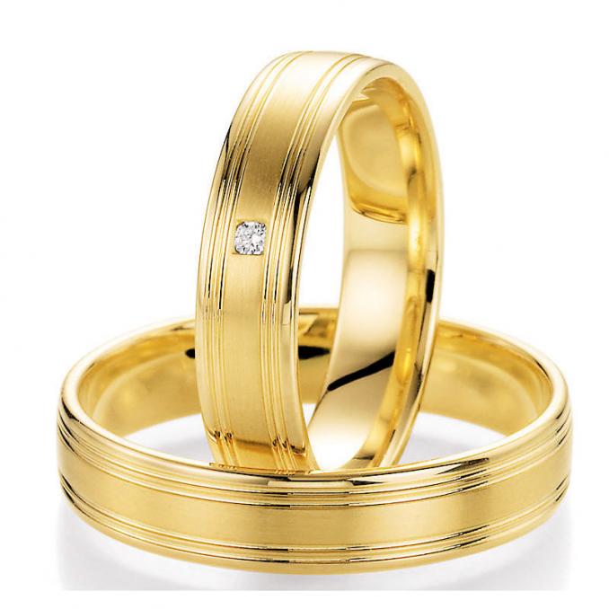 Strahlende Fair Trade Trauringe aus Gelbgold mit Diamanten 121041
