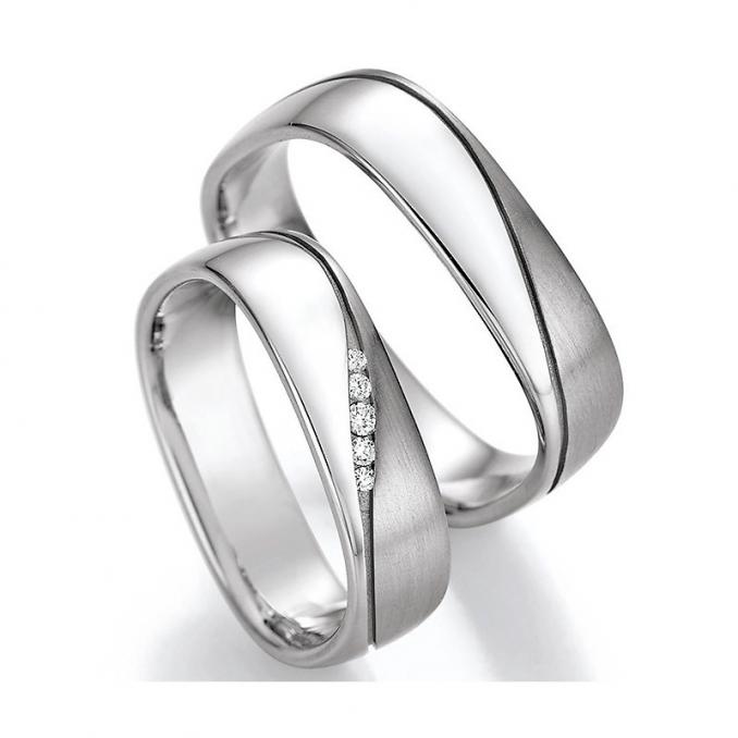 Außergewöhnlich geformte Eheringe aus Palladium 500 mit mehreren Diamanten 3560012