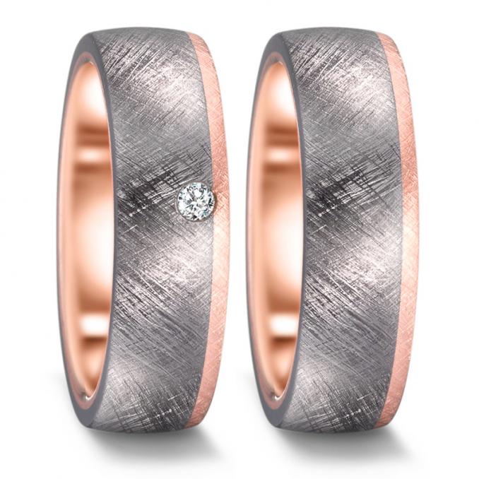 Aufnahme der Eheringe aus Tantal und Roségold eismattiert mit Diamanten