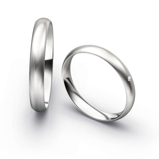 Aufnahme von schlichten sandmatten Trauringen aus Weissgold mit Diamanten mit 3,5 mm Breite