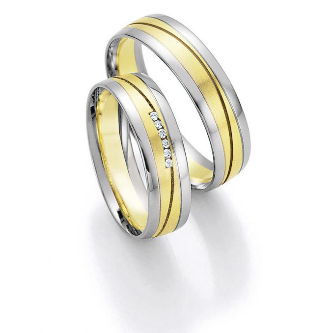 Aufnahme von Eheringen aus Palladium& Gelbgold mit Diamanten und bicolorem Design