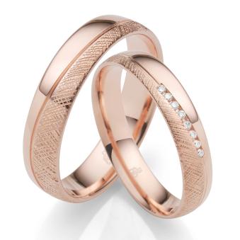 Eheringe aus Roségold mit Diamanten in polierter und strukturierter Oberfläche