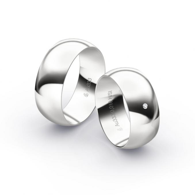 Eheringe aus Weissgold glatt poliert mit einem Diamanten in 8 mm Breite