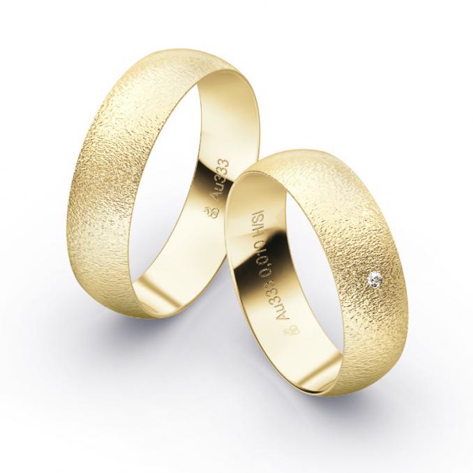 Aufnahme von Eheringen aus Gelbgold mit Körnung und Diamanten und 6 mm Breite
