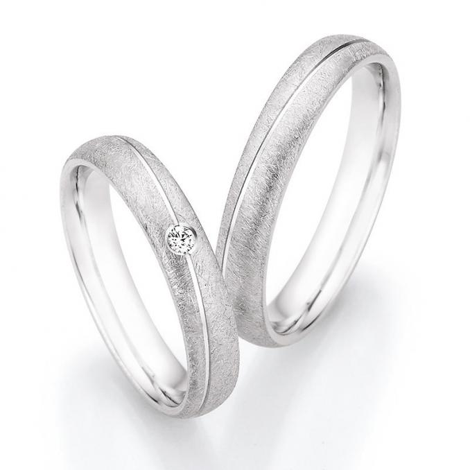 Eheringe aus Silber mit Eismattierung und Diamant